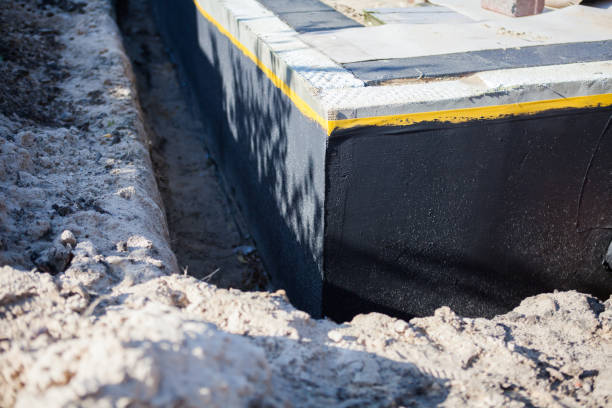 Professional Waterproofing technician working in Newberry, SC